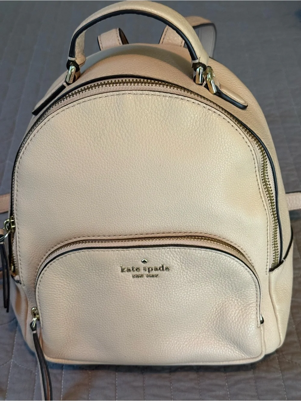 kate spade pebble leather mini backpack in blush beige